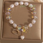Pulsera de cristales con dijes